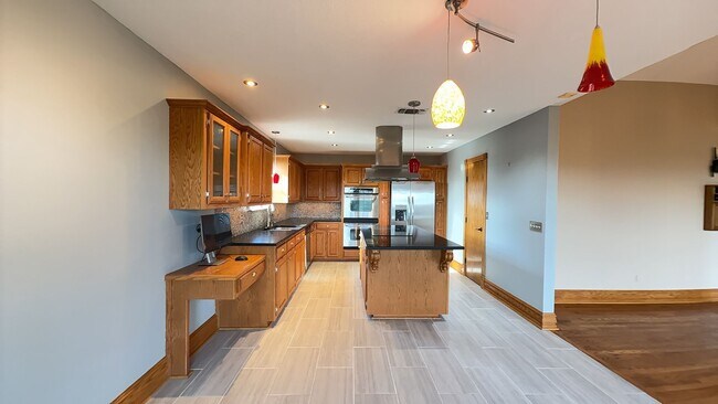 Building Photo - Welcome home to breathtaking views in this...