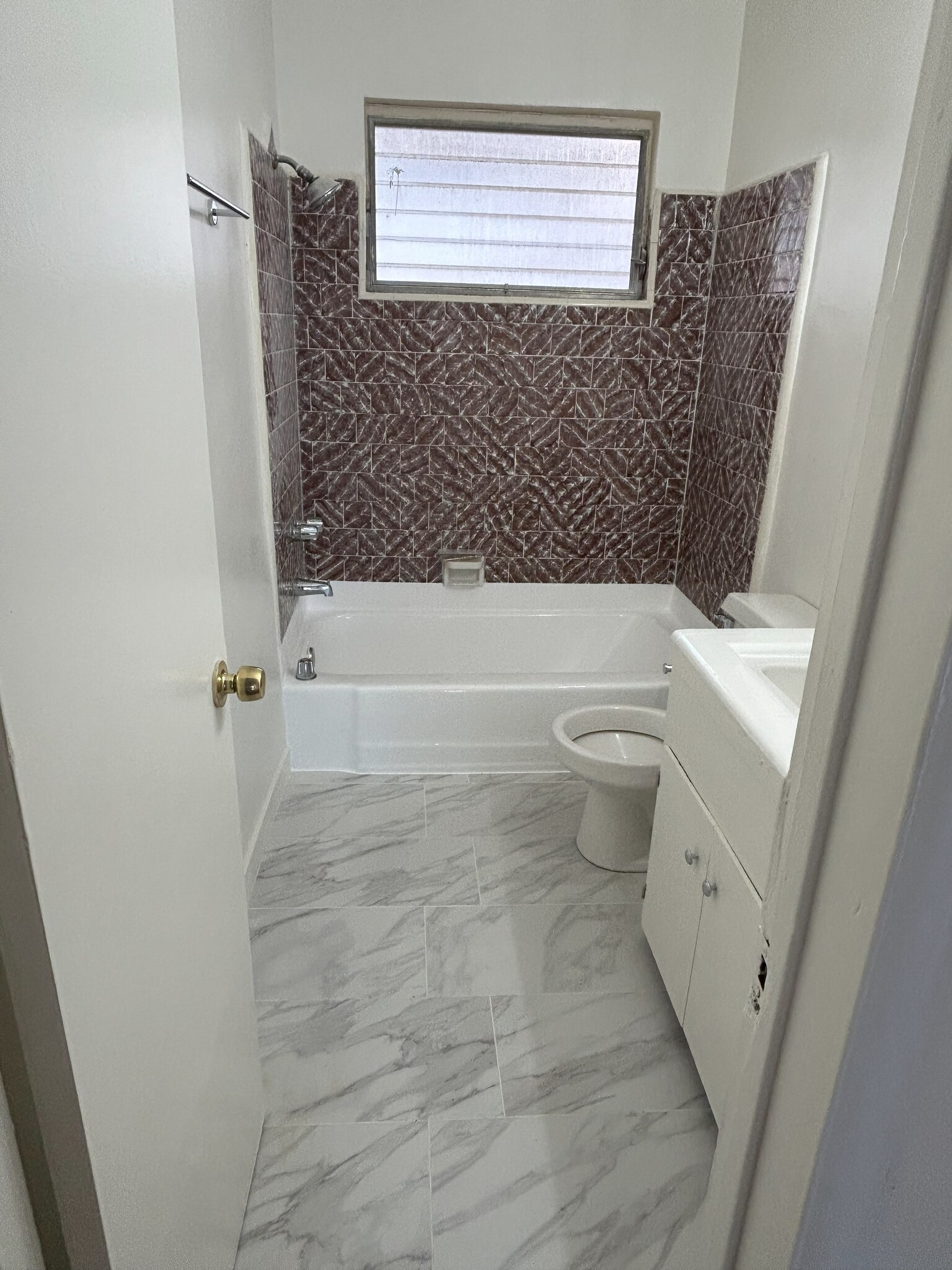 New Bathroom Floor - 7704 Romaine St