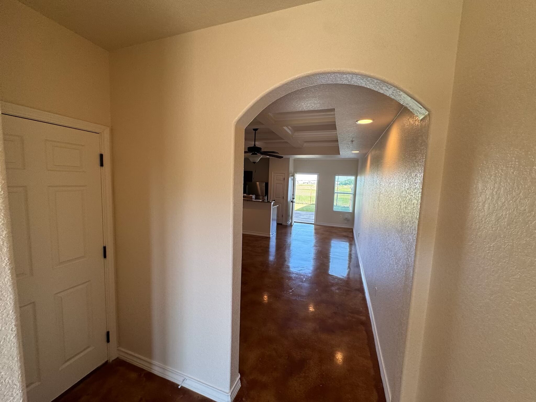 View from the front door. Clear view through to the backyard - 16715 Jupiter Haven