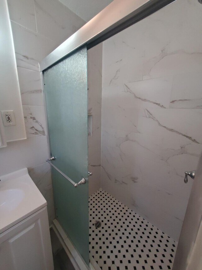 Building Photo - Annual Updated One Bedroom, One Bath Duplex Located in The Village of the Art