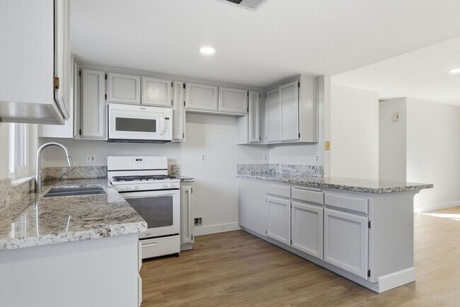 Building Photo - $1,000 Off First Month's Rent | 3-Bedroom Home with Detached 2-Car Garage, Fireplace & Private Patio