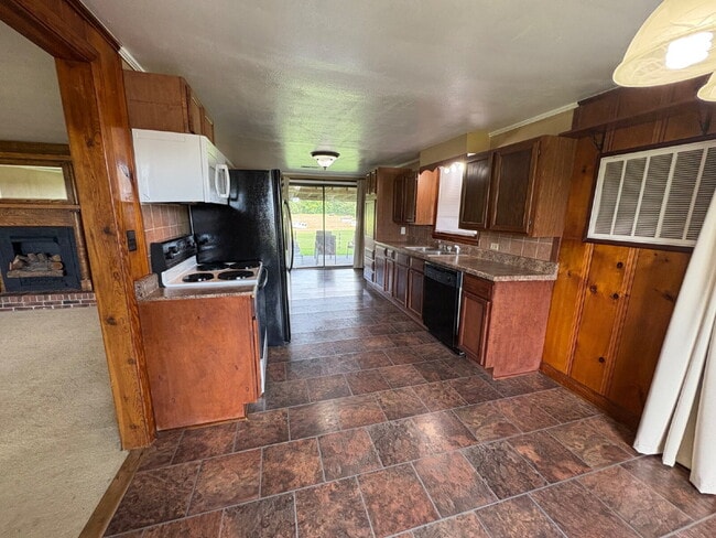 Building Photo - "Charming 3-Bedroom Retreat on Hwy 45 with...