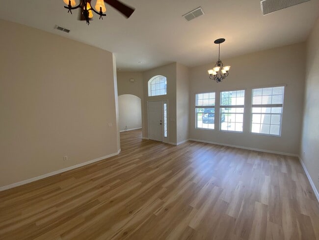 Building Photo - ANNUAL Lease – Unfurnished – Golf Course Lot - Designer Home in the highly sought-after gated com...