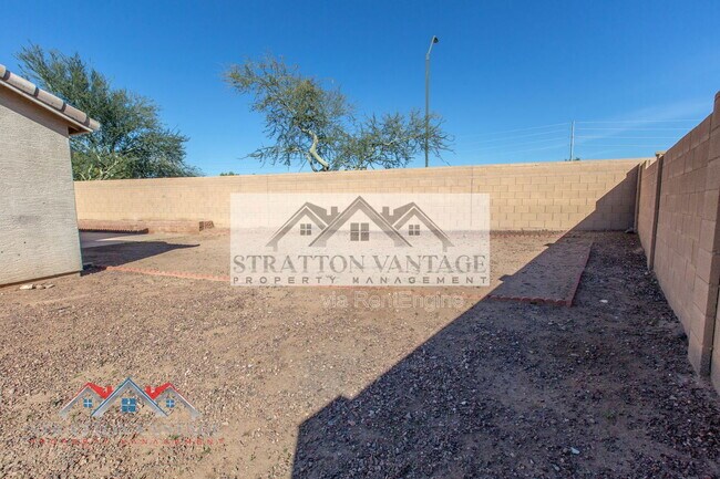 Building Photo - 11754 W Belmont Dr