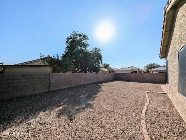 Building Photo - 7059 W Gardenia Ave