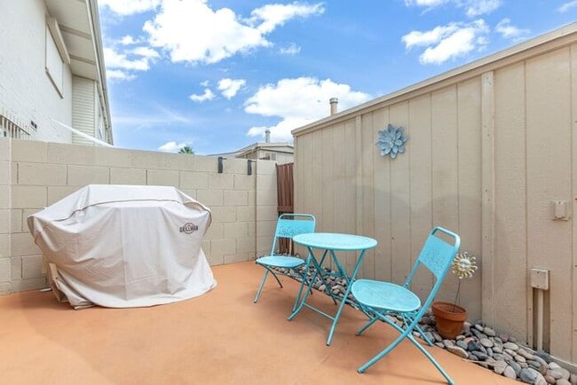 Building Photo - Discover this charming two-story townhome