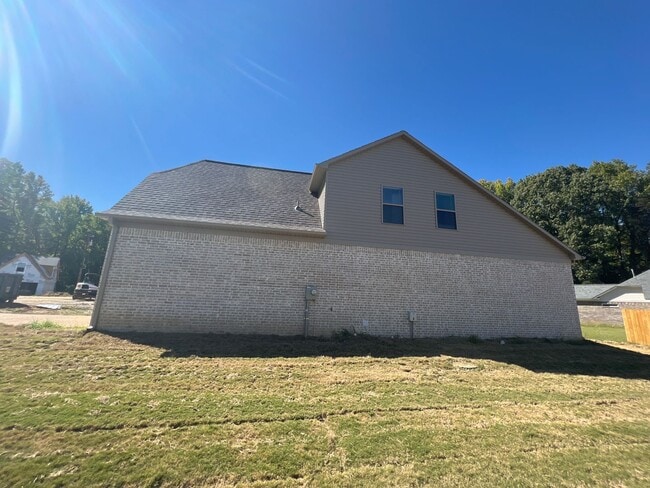 Building Photo - 4 bed, 2.5 bath house in Atoka built in 2022 now offering a move in gift card