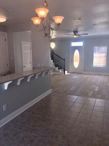 Tile floors downstairs - 1338 Tropical Cv