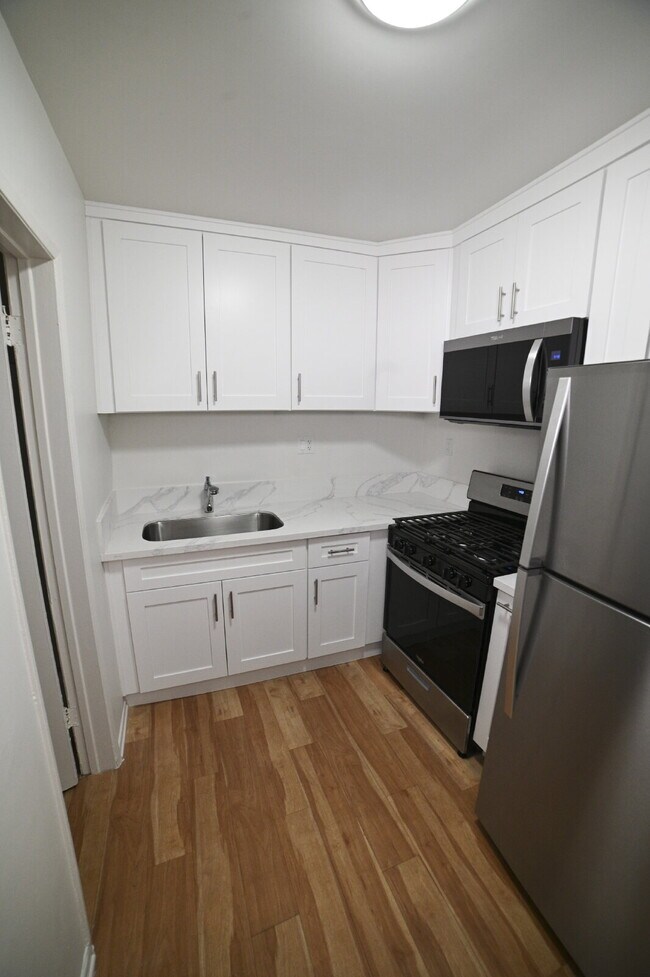 Building Photo - Newly remodeled studio in a gated building with pool and laundry room!