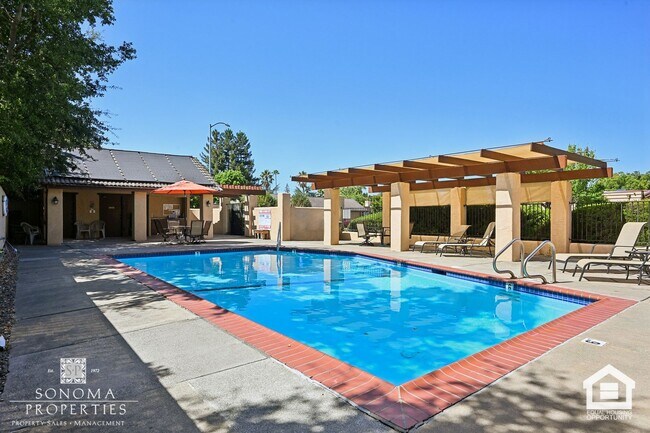 Building Photo - Southwestern Charm Meets Modern Comfort — 2BR/2BA Condo with Access to Shared Pool!