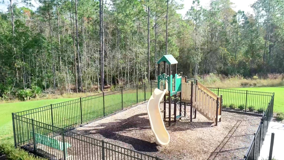 Building Photo - 5110 Magnolia Palm Dr