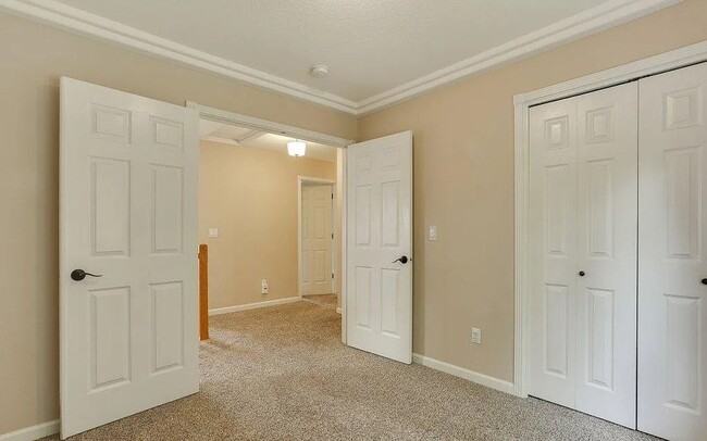 Building Photo - Spacious Four-Bedroom Home with Gourmet Kitchen, Multiple Living Areas, Loft, and Beautifully Lan...