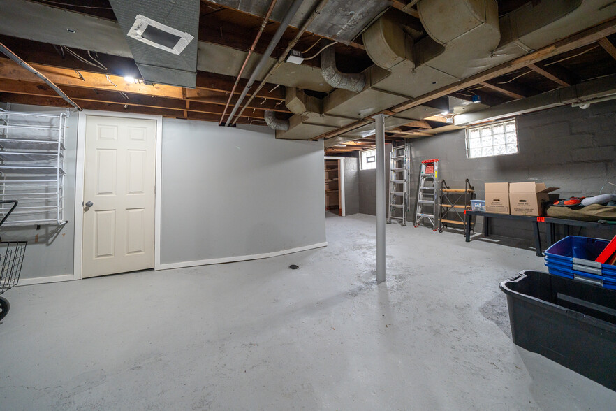 partly fininshed basement with washer/dryer - 694 W Hazelhurst St