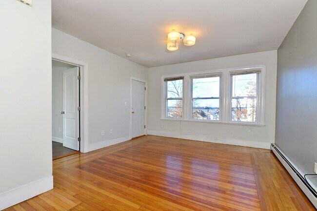 Building Photo - First Floor- 3 Bedroom with parking and ow...
