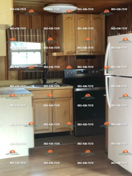 Kitchen with new stainless steel/black stove - 2854 Tindel Camp Rd