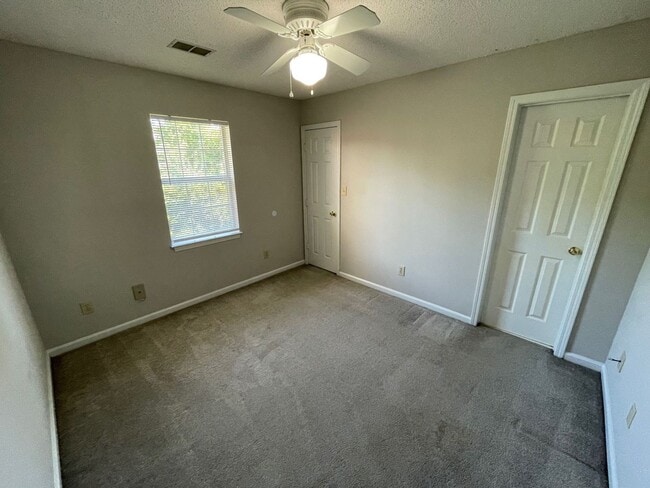 Building Photo - PRE-LEASING FOR AUGUST 2025! 1/2 OFF SECUR...