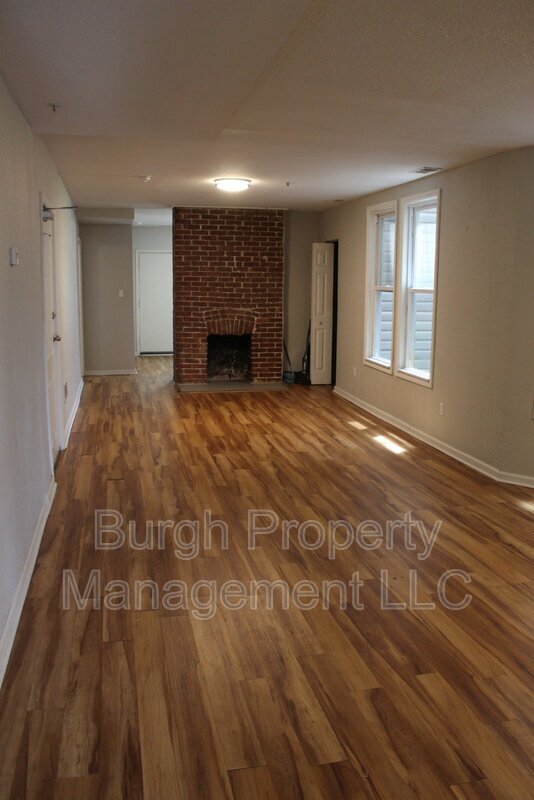 Building Photo - 114 W 8th Ave