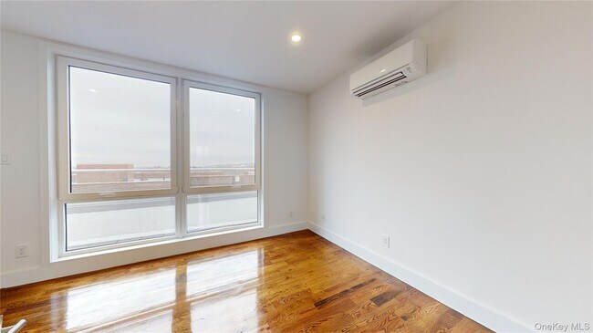 Building Photo - 138-28 Queens Blvd