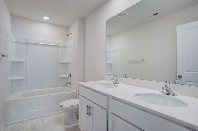 Building Photo - Modern 5-Bedroom Home Near Troutman – Show...