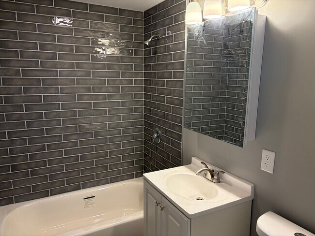 Building Photo - Fully Renovated 3BR/2BA Corner Twin Home-Move in Ready