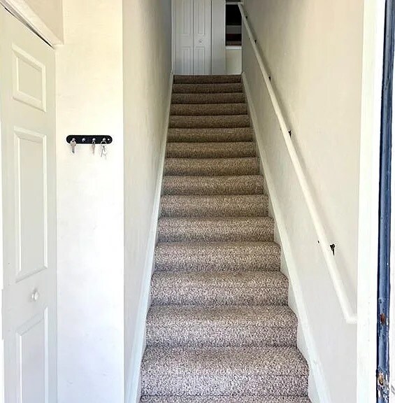 Storage Closet and Stairs to Main Floor - 14870 Pleasant Bay Ln