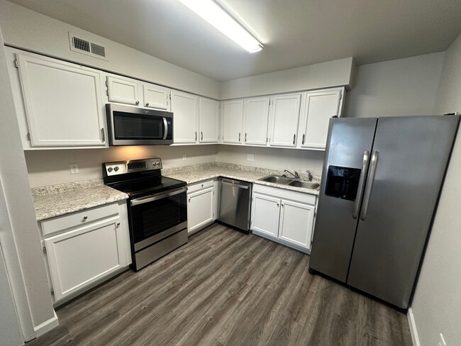 Updated Kitchen with stainless steel appliances - 4300 Arrow Tree Dr
