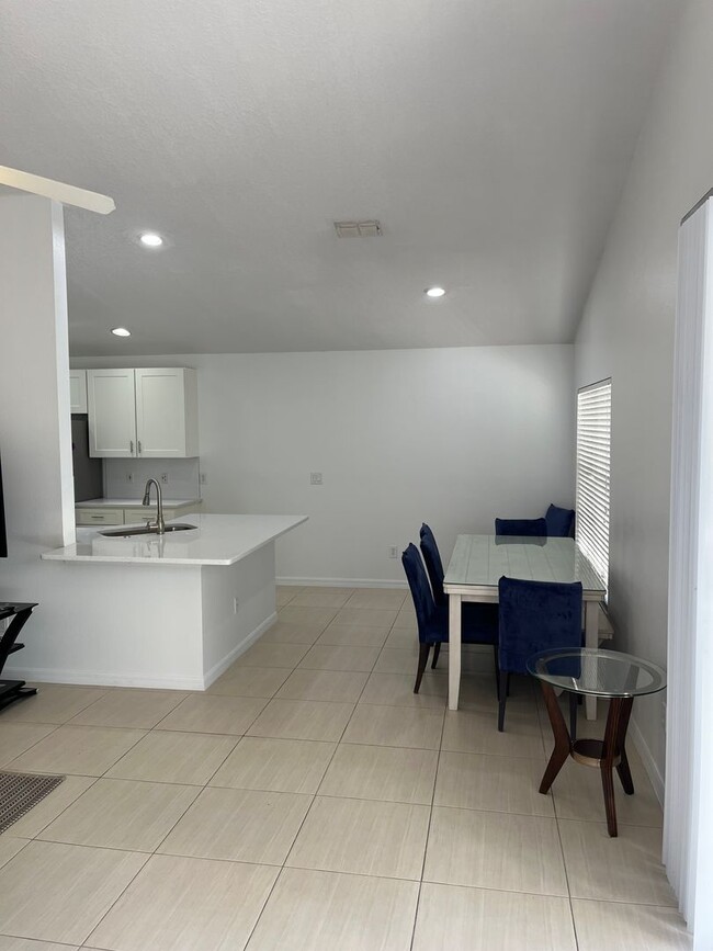 Building Photo - Fully Furnished Three-Bedroom Home!