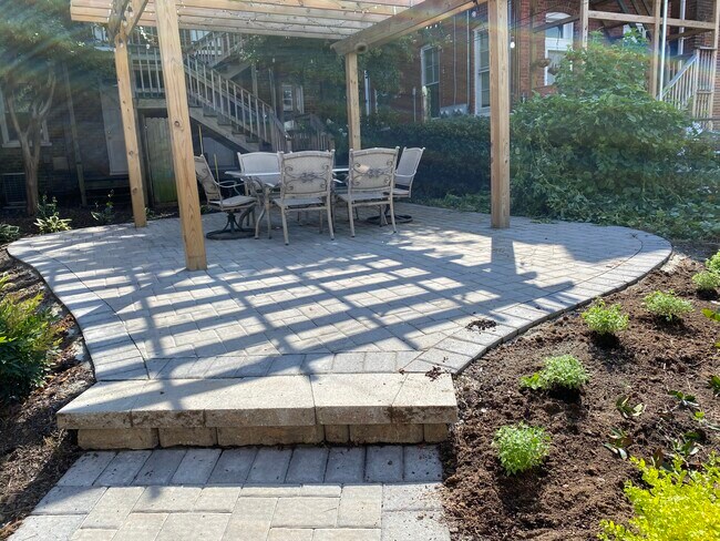 Rear yard-landscaped, fully fenced with gazebo - 2220 W Grace St
