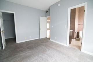 Building Photo - Spacious & Private Move In Ready Townhome ...