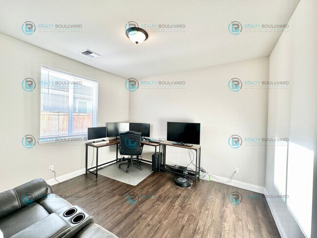 Building Photo - Welcome to your dream home, where modern elegance meets unparalleled convenience!