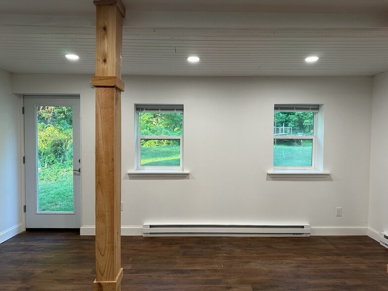 Living room w/ private entrance to shared yard - 108 Franklin St