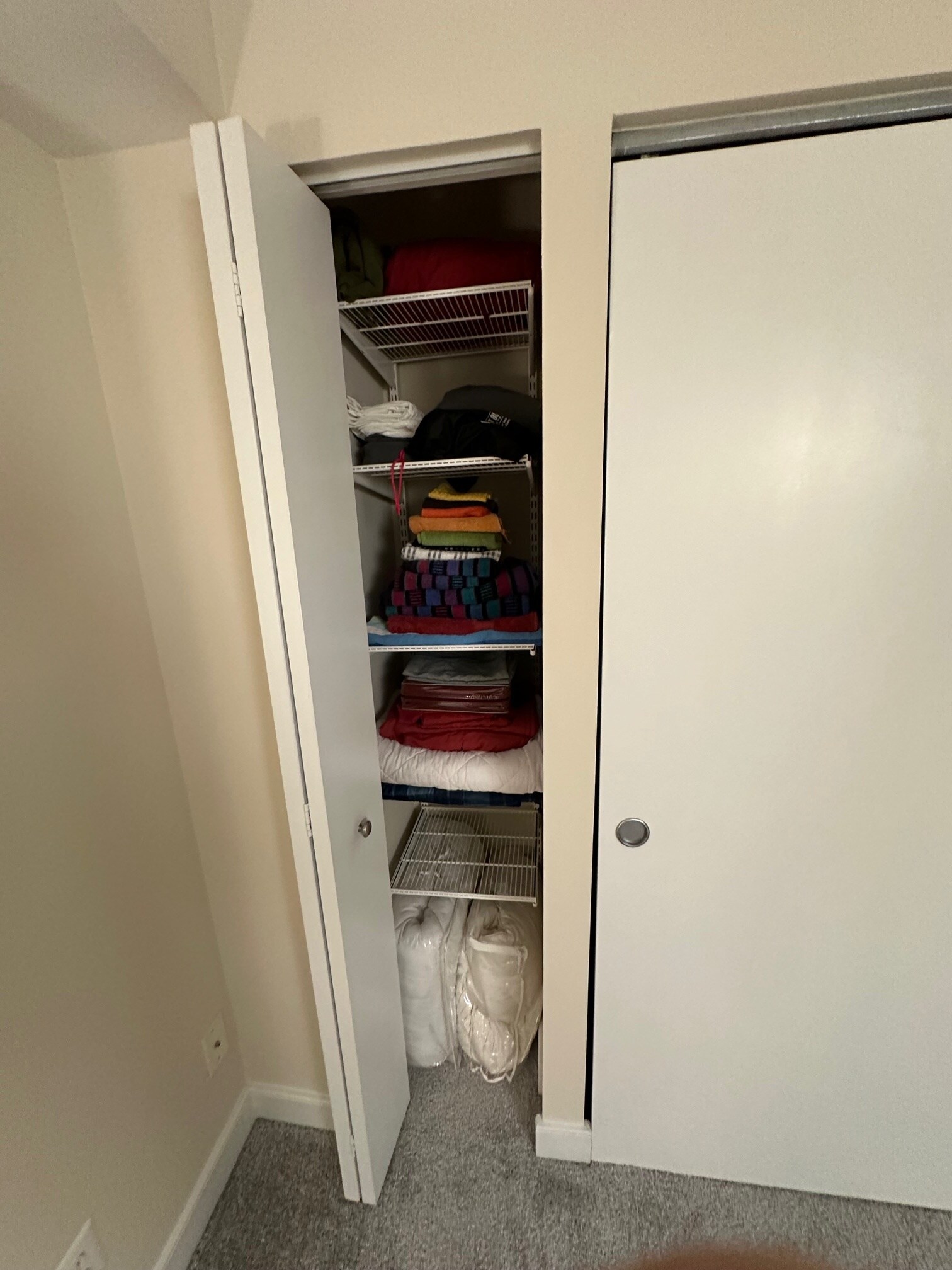 linen closet in second bedroom - 7500 Woodmont Ave