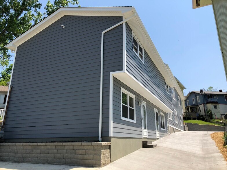 Brand new siding and stone work brings a fresh look to the exterior! - 441 West Virginia Ave.