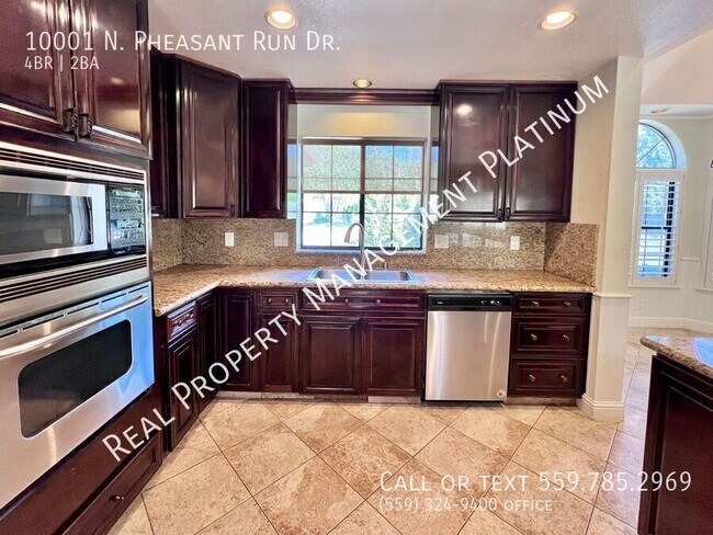 Building Photo - 10001 N Pheasant Run Dr