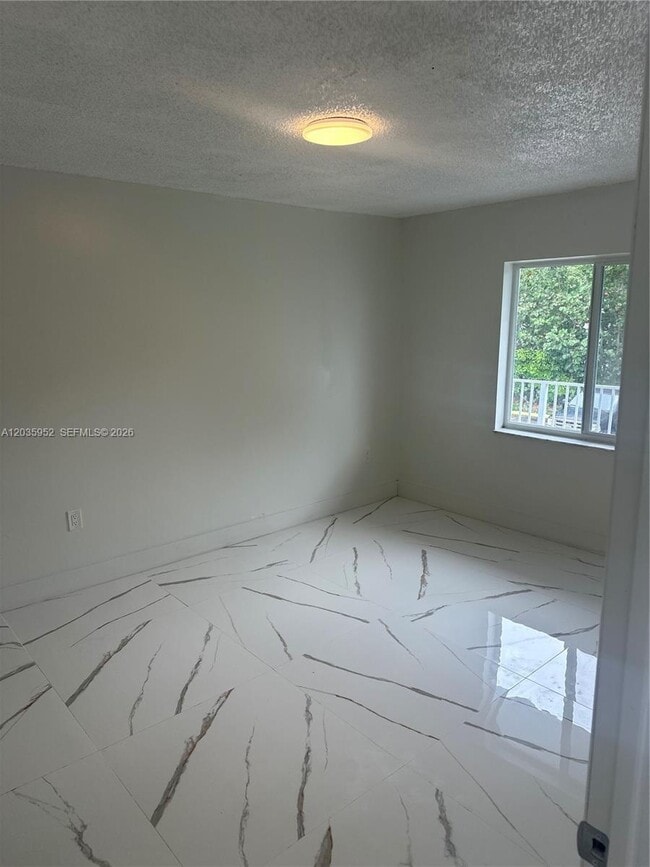 Building Photo - 17050 NW 55th Ave