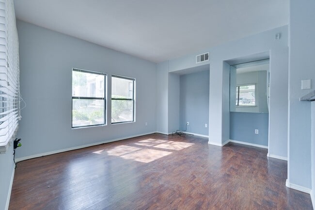 Building Photo - NW!! Gated!!! Clubhouse!!!Community Pool!!! 1st Floor Condo!!! Wood like floors!! No Carpet!!