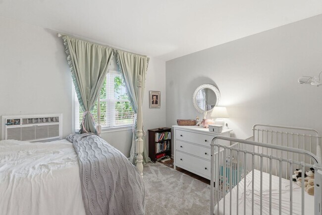 Building Photo - Bright Alexandria Condo with Private Patio & Community Pool!