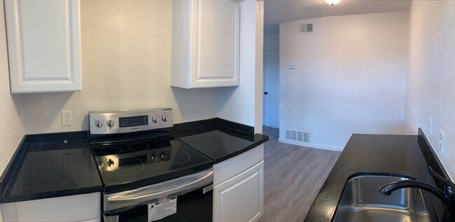Building Photo - East 12th Townhomes and Apartments