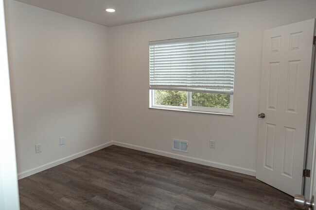 Building Photo - 7355 S Garfield Ct