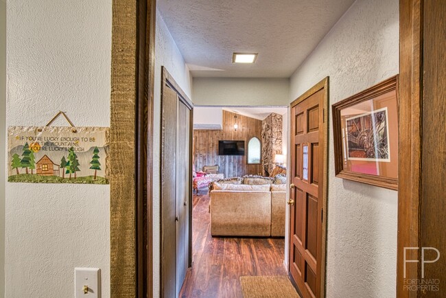Building Photo - On the Blue River!  HUGE 4 Bedroom home, Furnished Updates throughout!  Bus route!  Spacious parking