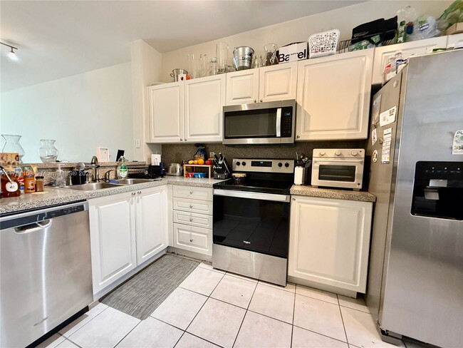 Building Photo - 5560 NW 107th Ave