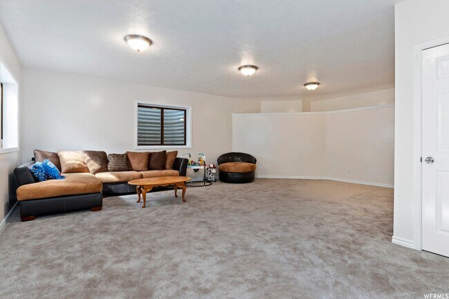 Building Photo - Beautiful home single level entry with out buildings and amazing landscaping - shorter term lease...