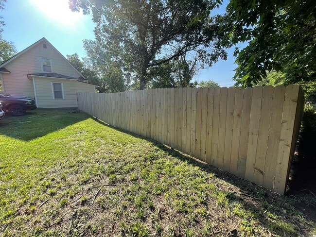 Building Photo - New Appliances + HUGE Fenced Backyard