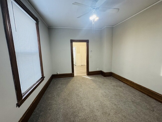 Building Photo - Charming 1-Bedroom + Den Retreat on Colfax Ave – Your Cozy Minneapolis Haven Awaits!