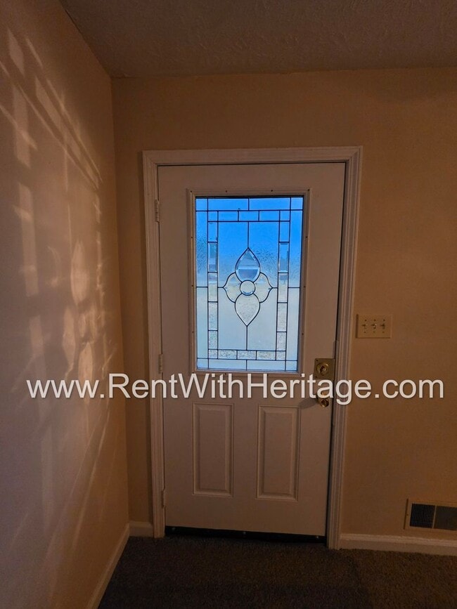 Building Photo - GREAT NEWS! 3 BEDROOM/ 2 BATH HOME WITH PARTIAL FINISHED BASEMENT