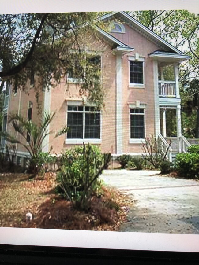 Front of house and side - 12 Bermuda Pointe Cir