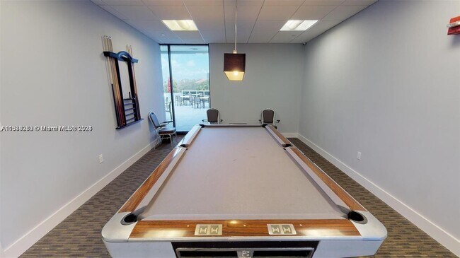Building Photo - 3675 N Country Club Dr