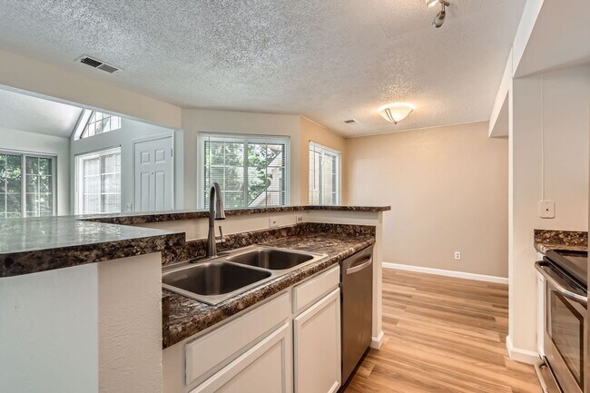 Building Photo - MOVE-IN SPECIAL ($500): Spacious Condo wit...
