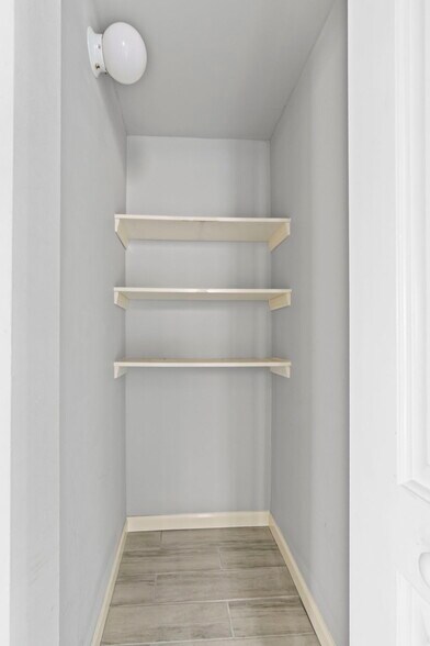 Separate pantry area providing additional storage for food, appliances, and household essentials. - 7028 S Peoria St