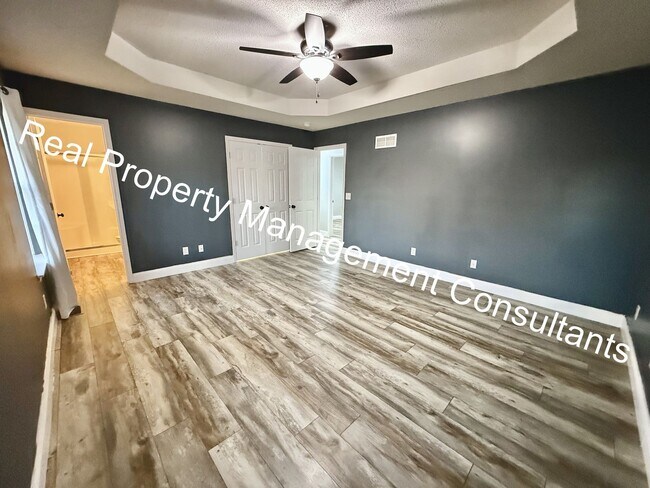 Building Photo - 4 Bedroom with Flexible Living & Modern Charm